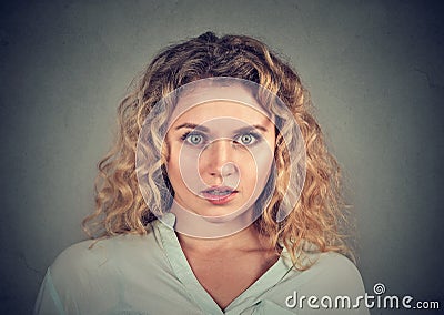 Portrait concerned scared shocked woman Stock Photo