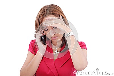 Concerned woman talking mobile phone Stock Photo