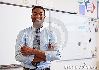 Portrait of confident African American male teacher in class Stock Photo