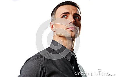 Portrait of a confident businessman looking up Stock Photo