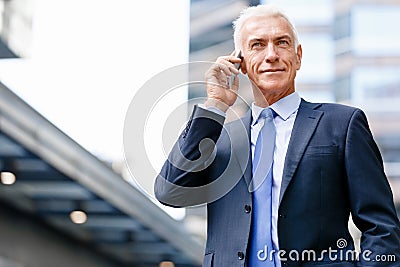 Portrait of confident businessman outdoors Stock Photo