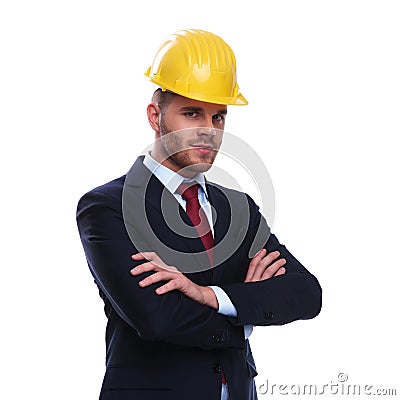 Portrait of confident businessman wearing an engineer helmet Stock Photo