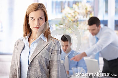 Portrait of confident businesswoman smiling Stock Photo