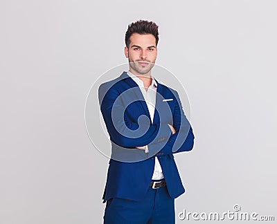 Portrait of confident smart casual man in blue suit smiling Stock Photo