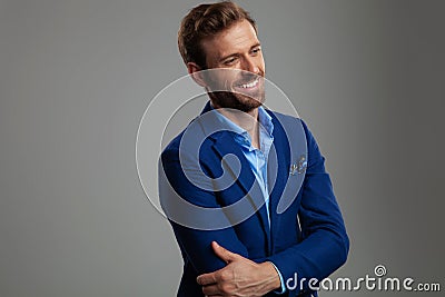 Portrait of confident smart casual man looking down to side Stock Photo