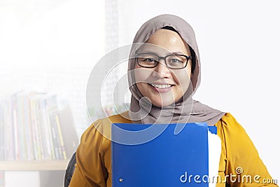 Smiling Confident Muslim Businesswoman Stock Photo