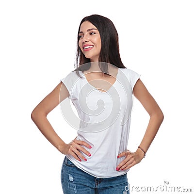 Portrait of confident woman in white t-shirt looking to side Stock Photo