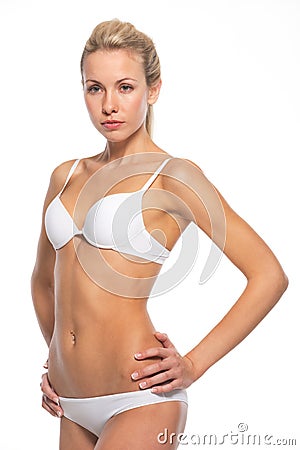 Portrait of confident young woman in lingerie Stock Photo