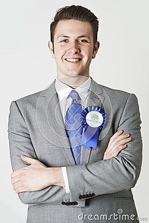 Portrait Of Conservative Politician Wearing Blue Rosette Editorial Stock Photo