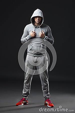 Portrait of cool looking young guy in sportswear. Stock Photo