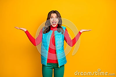Portrait crazy astonished girl hold hand present advertisement choose decide advise promotion scream wow omg recommend Stock Photo