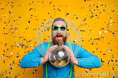 Portrait crazy funky cheerful gentleman enjoy night life hold glittering ball want party hart discotheque club Stock Photo