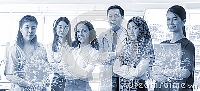 Portrait of a creative professional team at Succeeded, stood looking at the camera and smiled Stock Photo