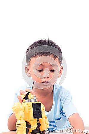 Portrait of cute child asian little boy playing robot Stock Photo