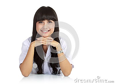 Portrait of a cute doctor at table Stock Photo