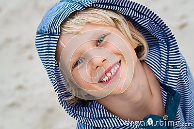 Portrait of cute, happy child at the beach Stock Photo