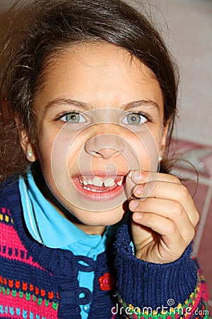 Portrait of cute kid losing his first tooth Stock Photo