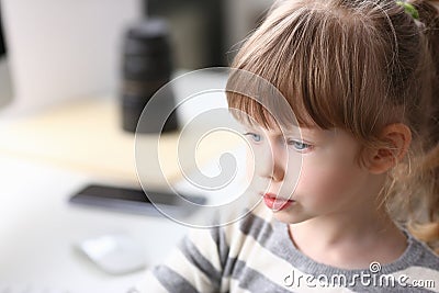 Portrait of cute little girl thinking of something Stock Photo