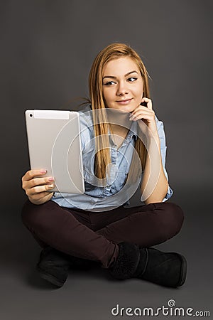 Portrait of a cute teenage sitting and taking photo Stock Photo