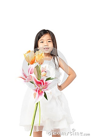 Portrait of so cute thoughtful asian child girl with flower in hands isolated on white background . Imagine, idea ,fun ,dreaming Stock Photo