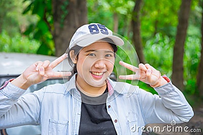 Portrait cute young innocent asian teen smile hapy expression Stock Photo