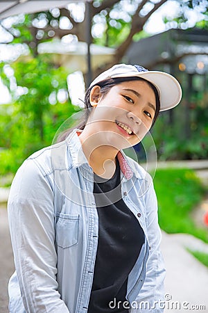 Portrait cute young innocent asian teen smile hapy expression Stock Photo