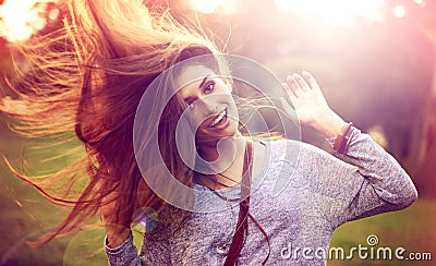 Portrait, dance and hair for happy woman person, nature and freedom in outside park. Smile, confidence and dancer in Stock Photo