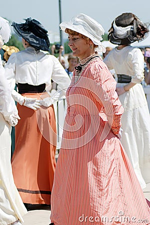 Portrait of dancing women in historical costumes. Editorial Stock Photo