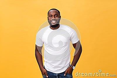 Portrait of delighted African American male with positive smile, white perfect teeth, looks happily at camera, being Stock Photo