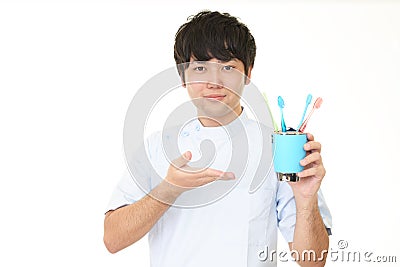 Smiling dental hygienist Stock Photo