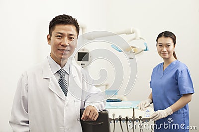 Portrait Of Dentist In Clinic Stock Photo