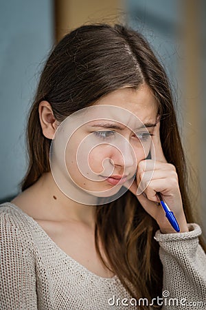 Portrait of a disappointed adolescent girl. Outdoors Stock Photo