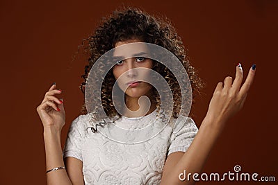 Portrait of a disappointed, dissatisfied girl Stock Photo