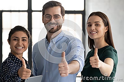 Portrait of diverse businesspeople show thumbs up Stock Photo