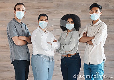 Portrait of diversity team with mask for covid safety, health or protection from bacteria, virus or covid 19. A group of Stock Photo