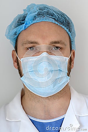 Portrait of a doctor with face mask in the hospital Stock Photo