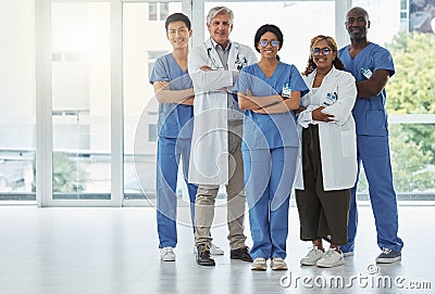 Portrait, doctors and team of nurses with arms crossed standing together in hospital. Face, confident and medical Stock Photo