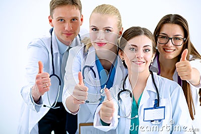 Portrait of doctors team showing thumbs up Stock Photo