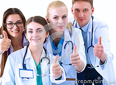 Portrait of doctors team showing thumbs up Stock Photo