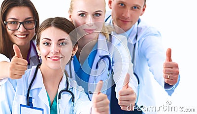 Portrait of doctors team showing thumbs up Stock Photo