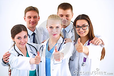 Portrait of doctors team showing thumbs up Stock Photo