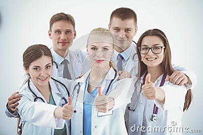 Portrait of doctors team showing thumbs up Stock Photo