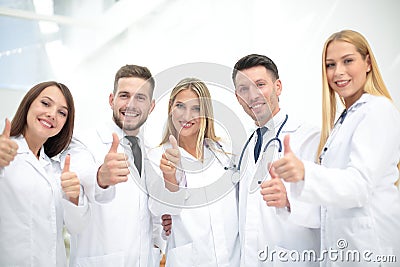 Portrait of doctors team showing thumbs up Stock Photo