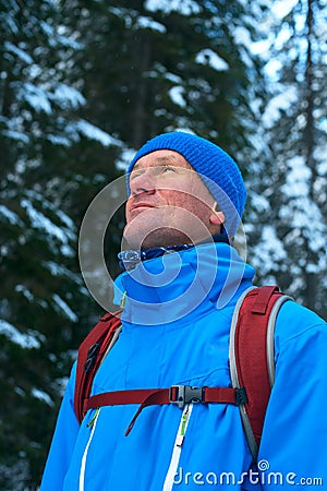 Portrait of a dreaming hiker. Winter. Stock Photo