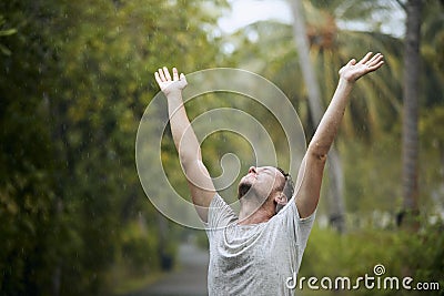 Portrait of drenched man in rain Stock Photo