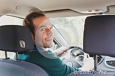 Portrait of driver in the car or taxi Stock Photo