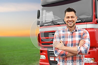 Portrait of driver at modern truck outdoors Stock Photo