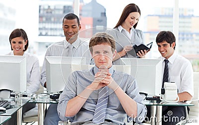 Portrait of a dynamic business team at work Stock Photo