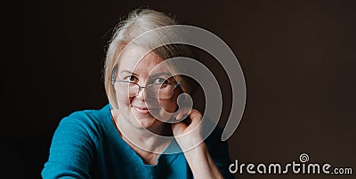 Portrait elderly beautiful woman retired glasses background house Stock Photo