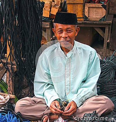 PORTRAIT OF ELDERLY MAN IN INDONESIA Editorial Stock Photo
